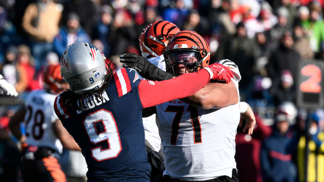 OT La'el Collins (71) blocks DE Matthew Judon (9)